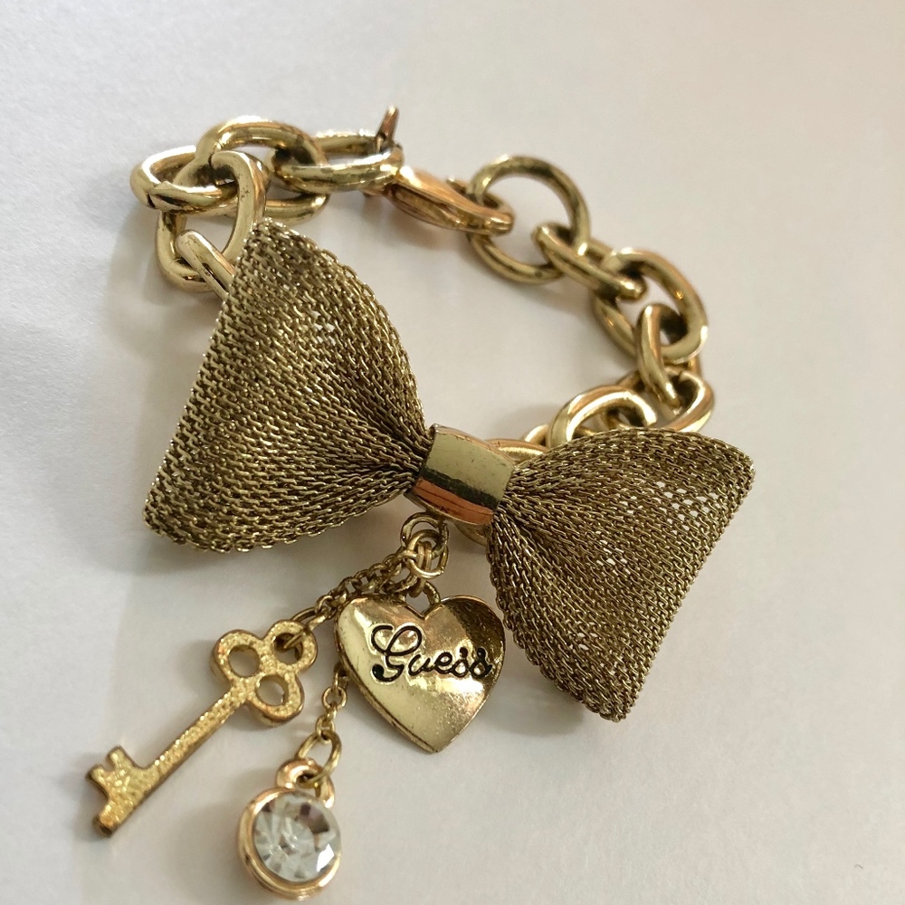 Gold Guess Women's Bow Bracelet